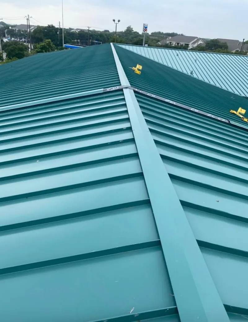 Green commercial metal roof ridge and valley for Metal Roof Repair in St. Augustine Beach